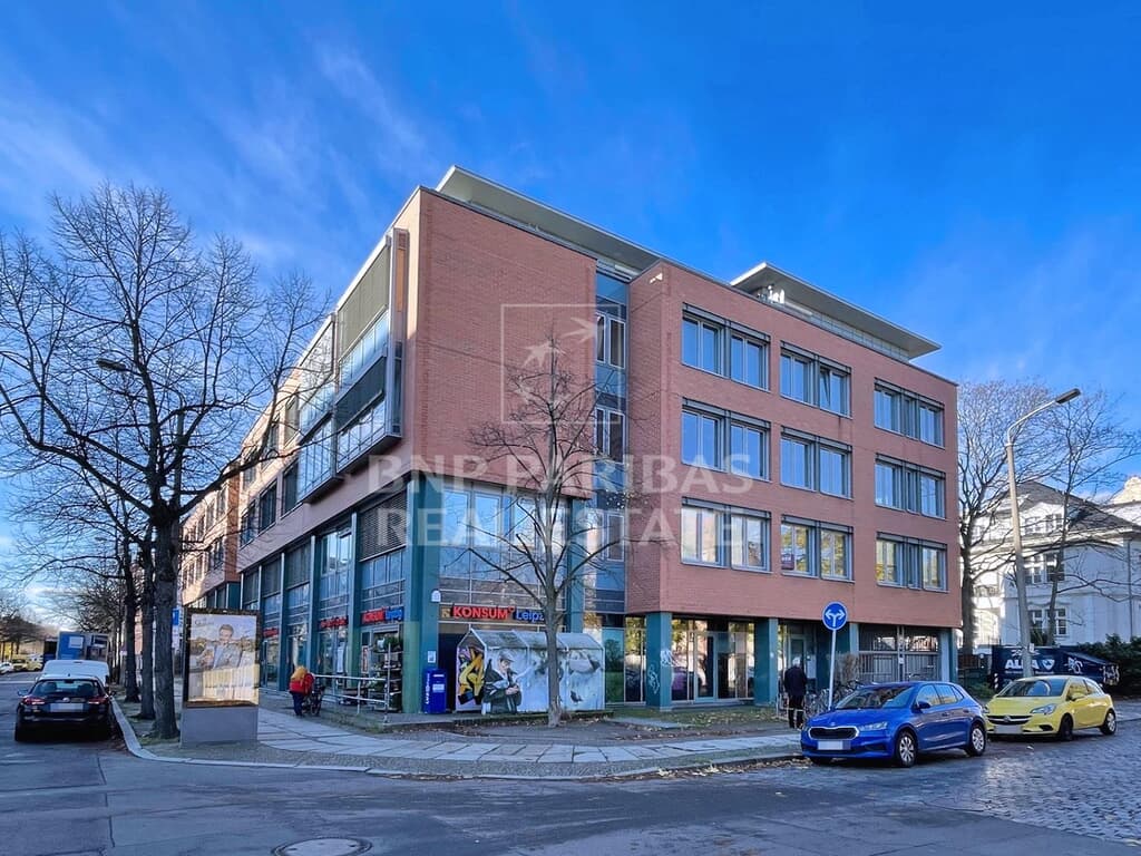 Modernes Wohn- und Geschäftshaus in gepflegten Villenviertel